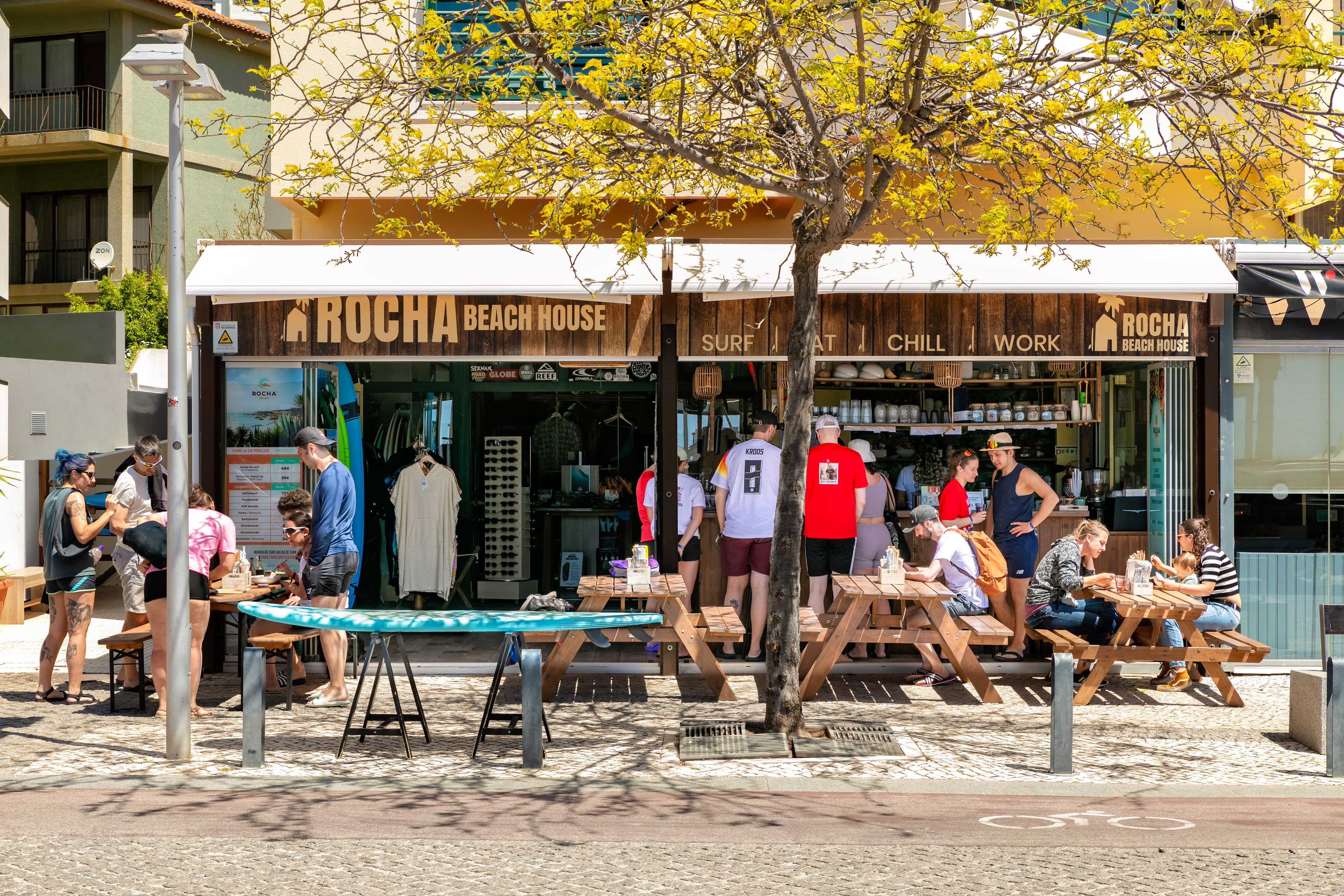 Rocha Beach House outside view with people sitting outside and enjoying their food and beverages.